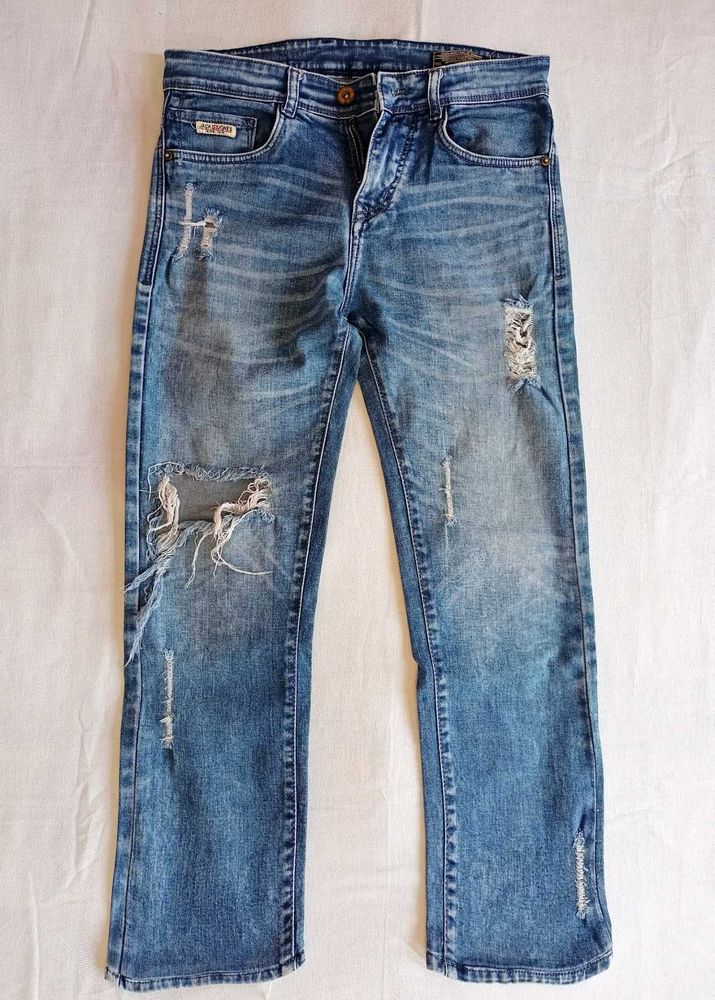 Distressed Blue Wash Denim Jeans