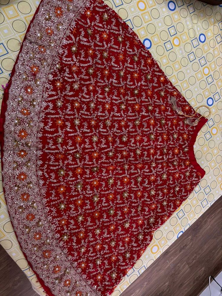 Red EmbellishedBridal Lehenga Choli
