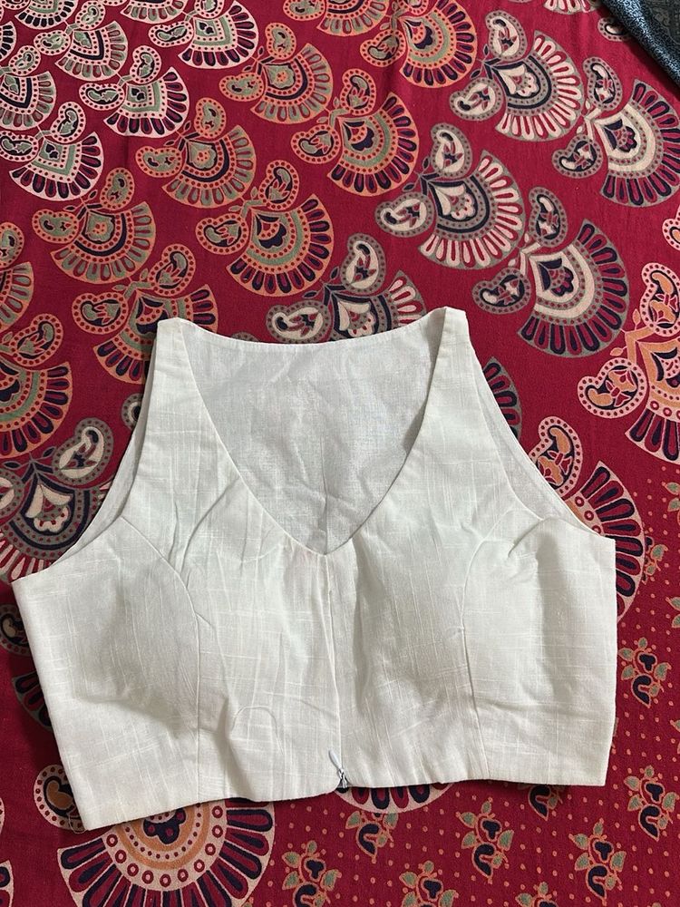 White Sleeveless Blouse