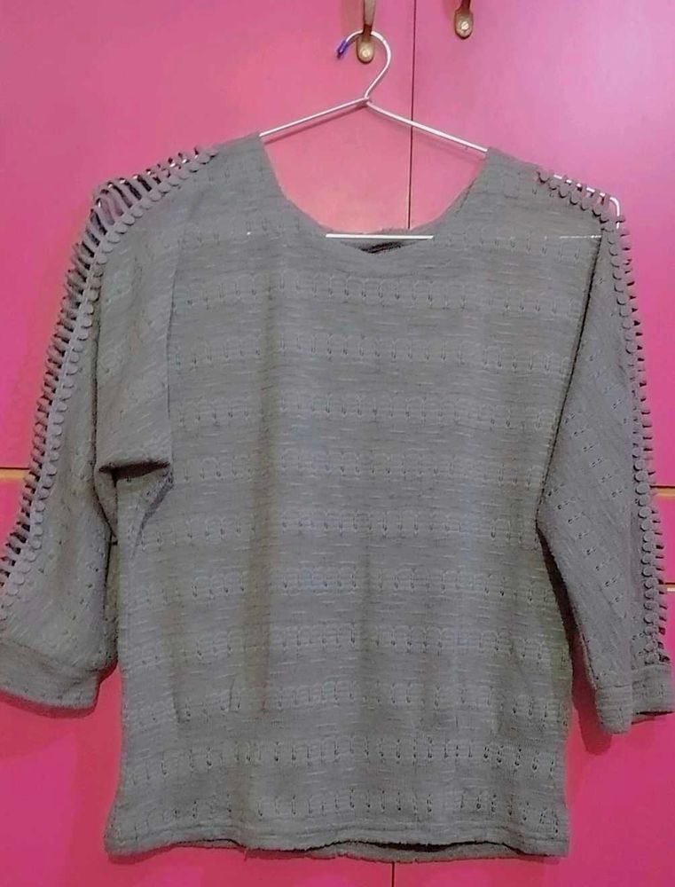 Gray Knit Top with side cut designs in both hands