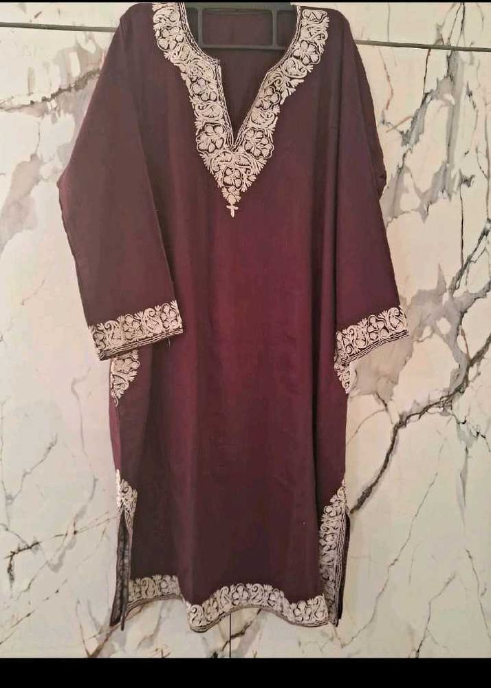 Elegant Embroidered Kurti With Vintage Earrings