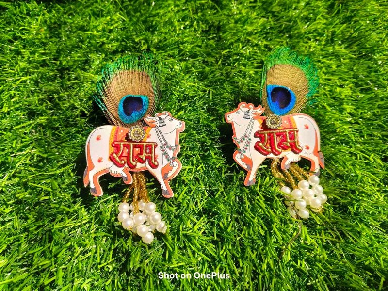 Cow Showpiece with Peacock Feather
