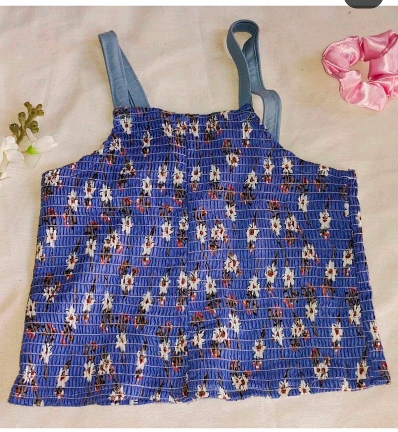 Super pretty floral blue smocked halter top, just for you pretty girls!💙Bust- 30-34 inches