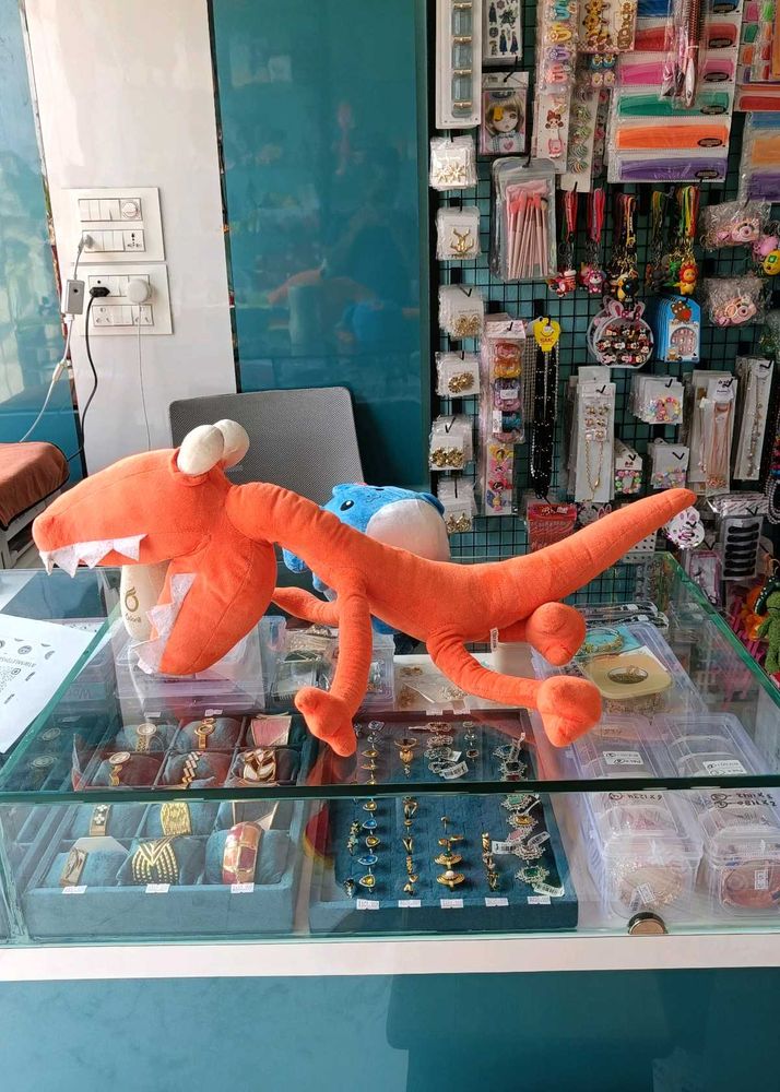 Orange Dinosaur Plush