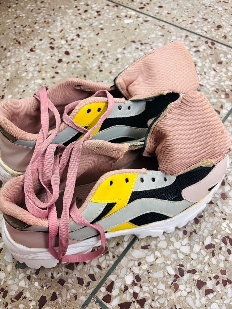 Well-loved Pink Sneakers