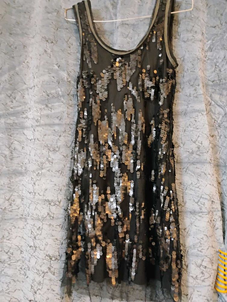 A BLACK SEQUIN DRESS