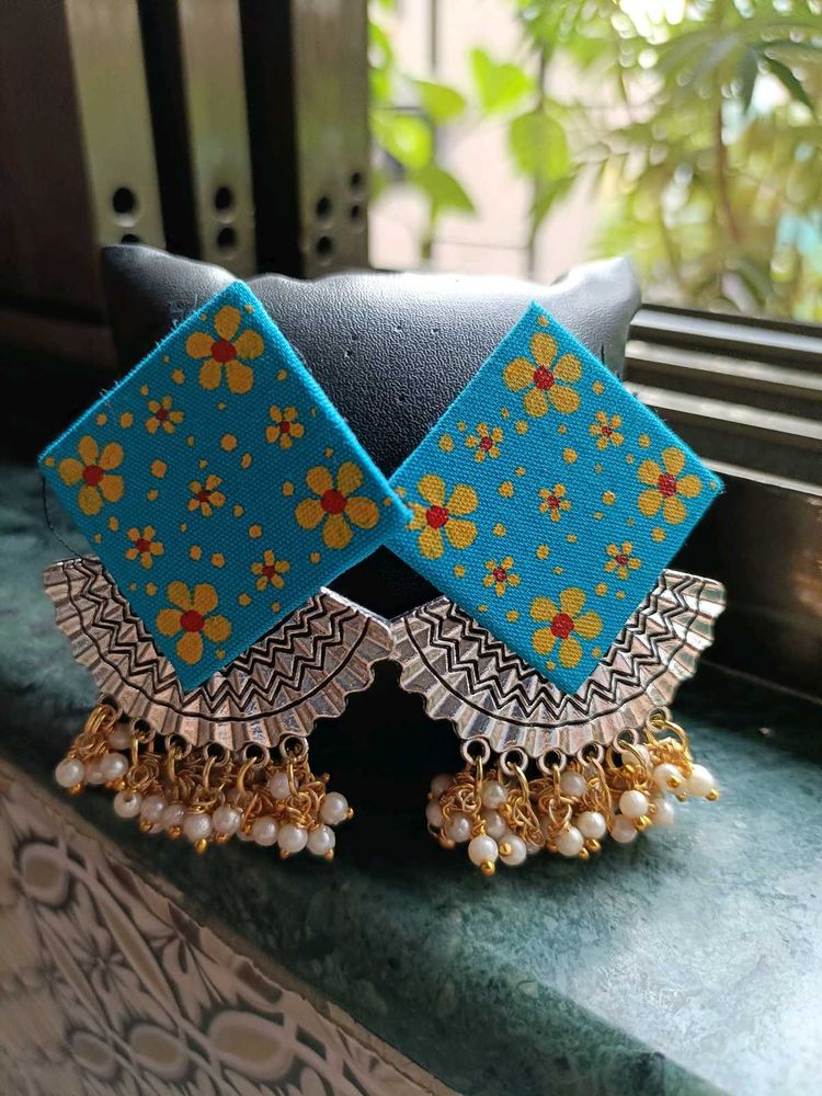 A Handmade Beaded Fabric Earnings