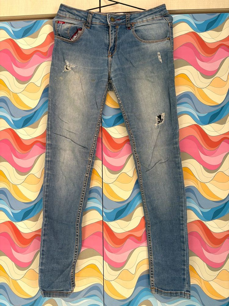 Ripped Light Wash Jeans