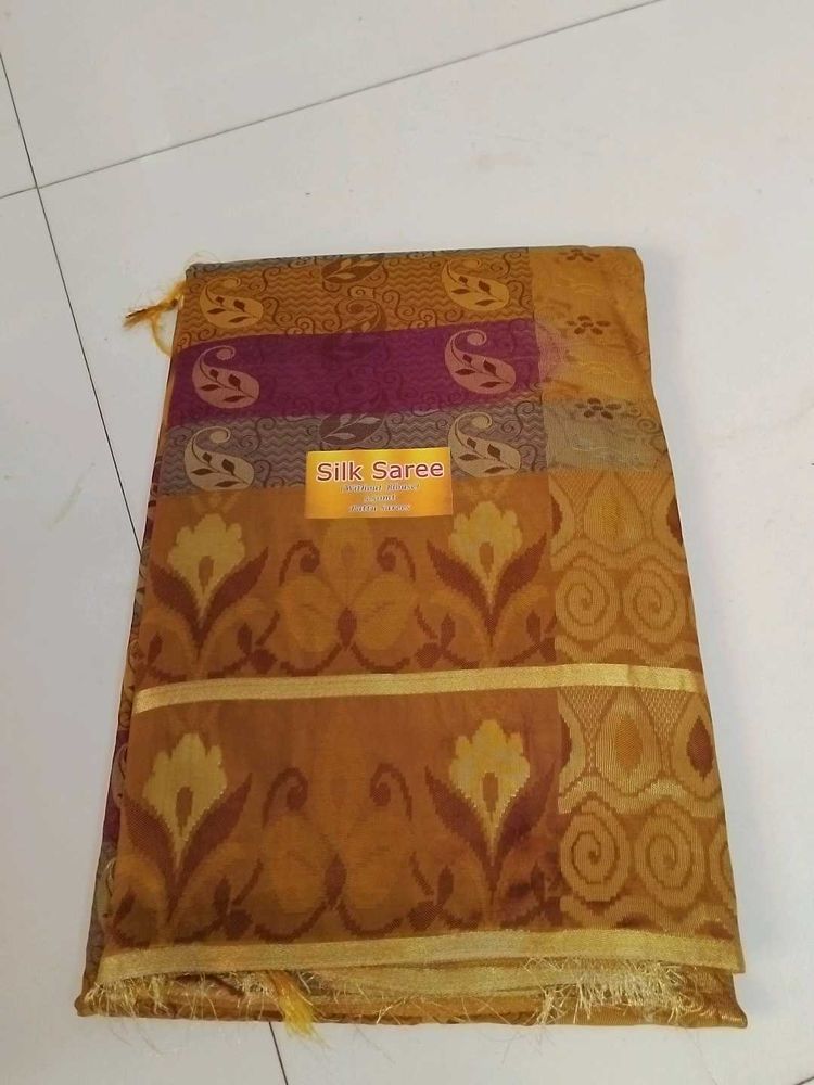 Tan With Meroon Semi Silk Saree ..