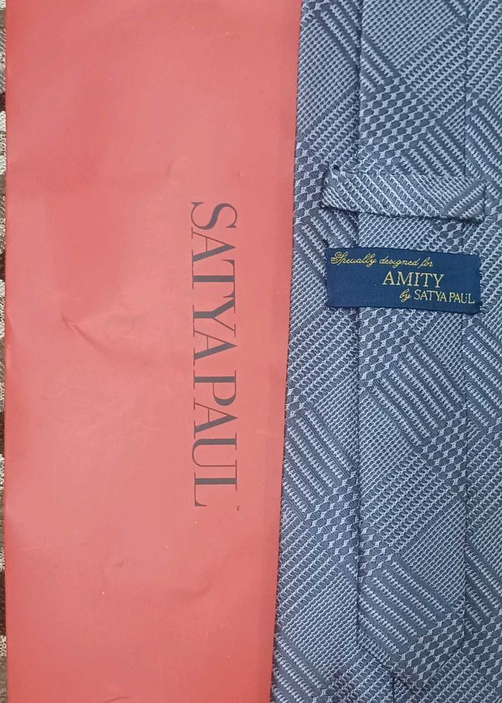 Satya Paul tie with an Amity tag. New.