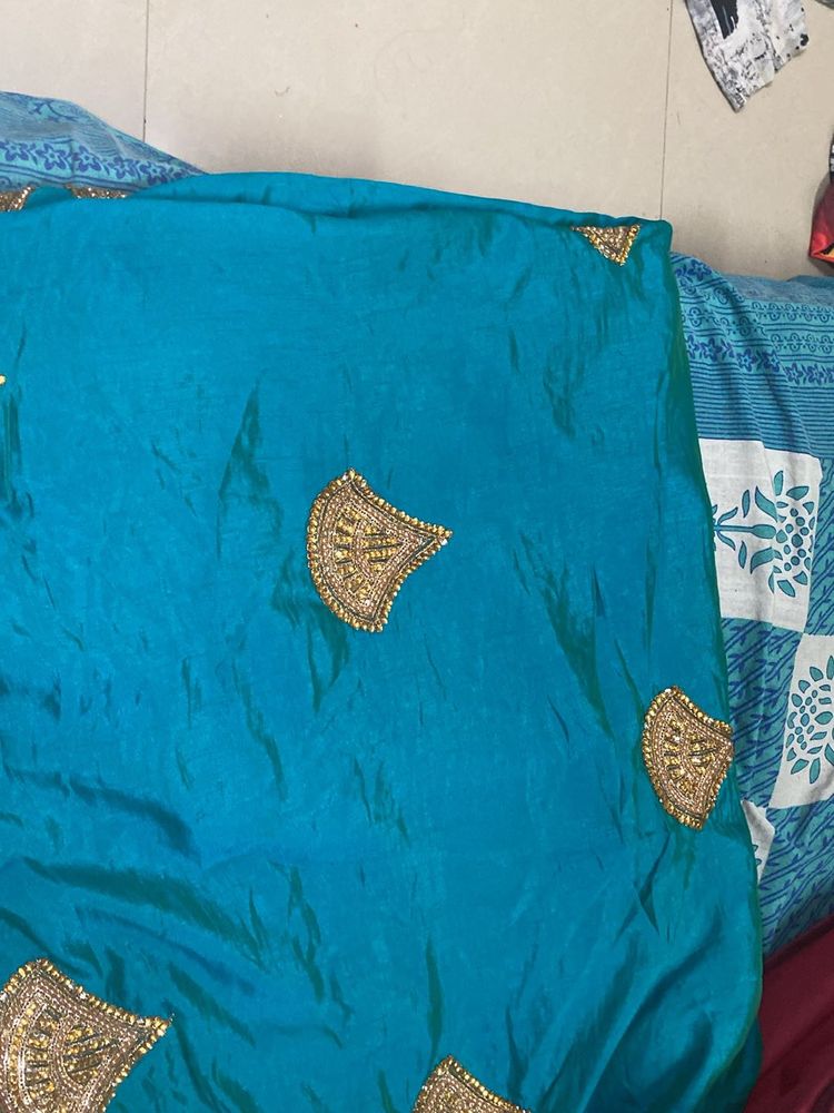 Teal Saree with Gold Embroidery