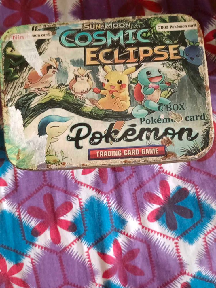 Cosmic Eclipse Pokemon Tin
