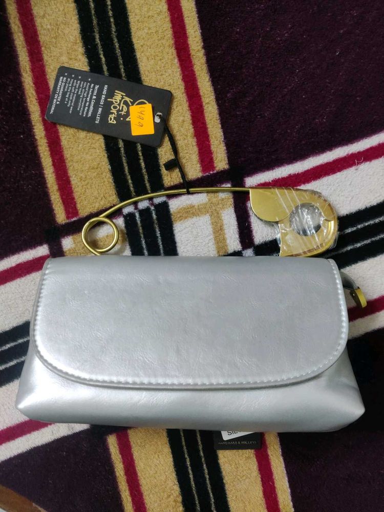 Silver Clutch with Safety Pin Detail