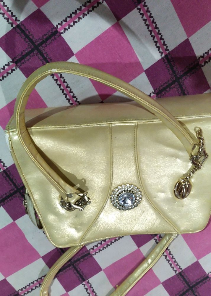 A Used Gold Colour Purse Ok In Condition