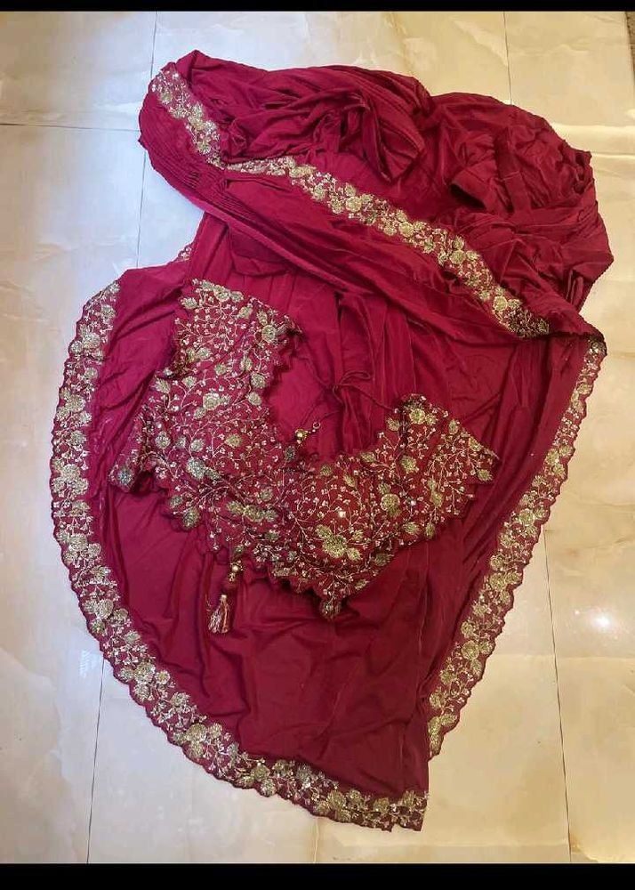 Elegant Maroon Embellished Saree