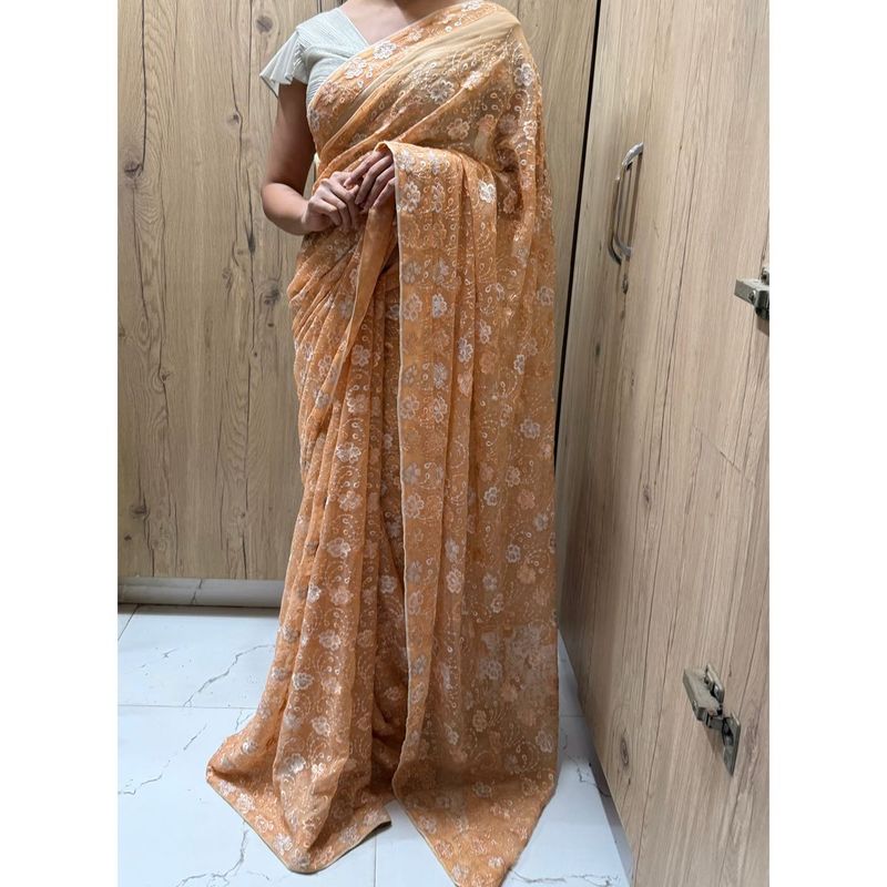 Elegant Peach Floral Saree