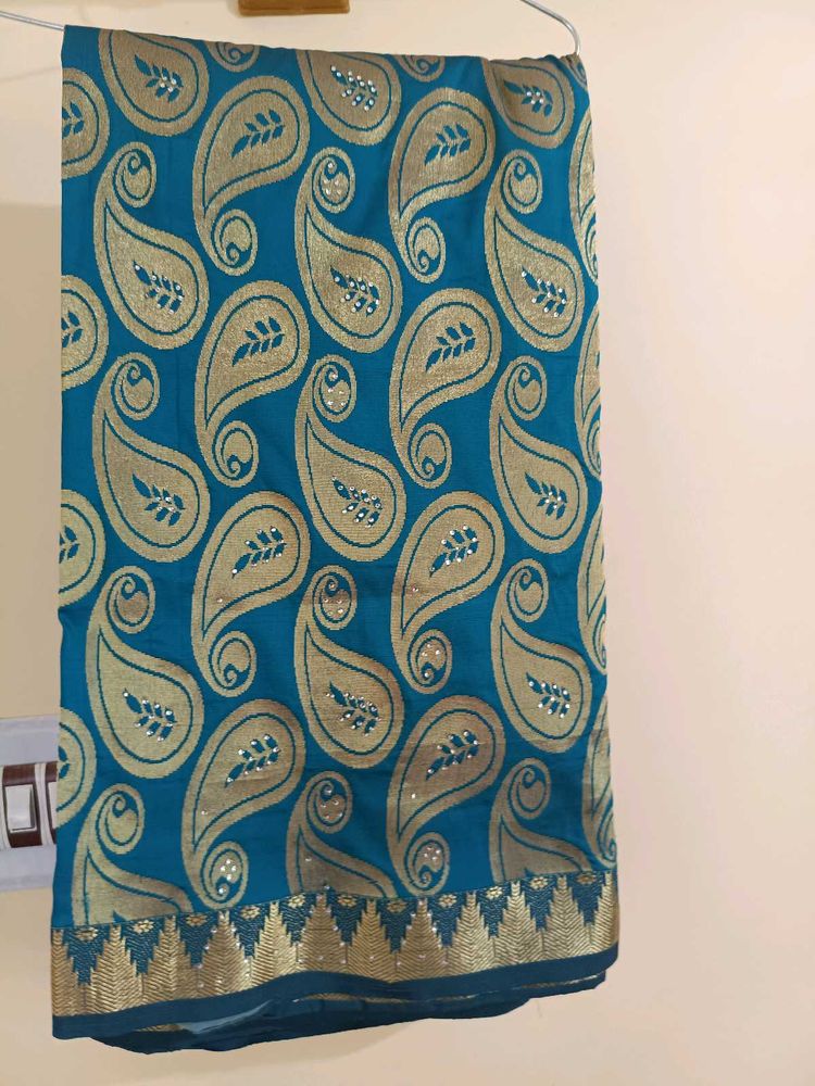 Elegant Teal Paisley Saree