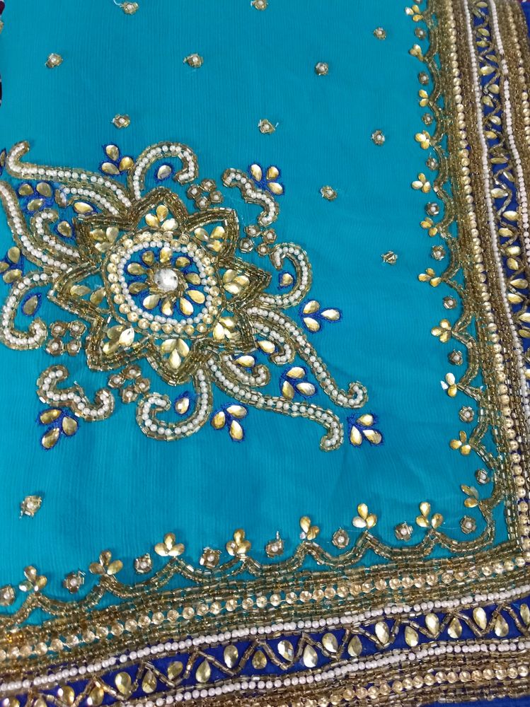 party wear saree firozi colour saree &amp; dark blue border with beautifu work as per showing in pic full length saree blouse size mention in pic