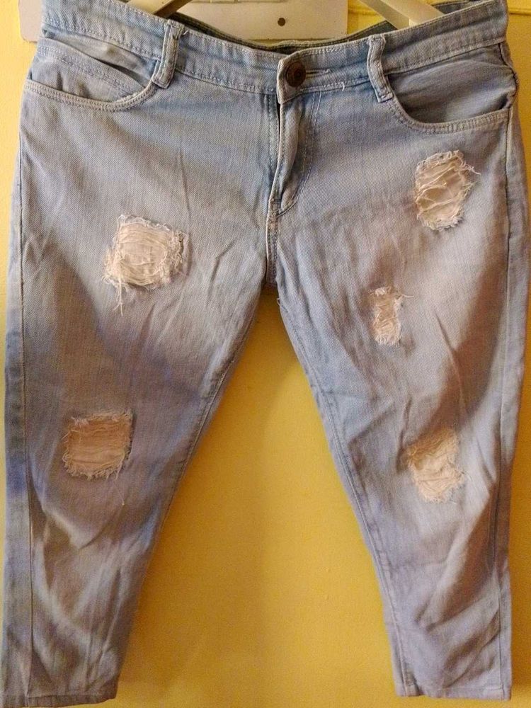 Short Ankle Length Ripped Jeans For Women