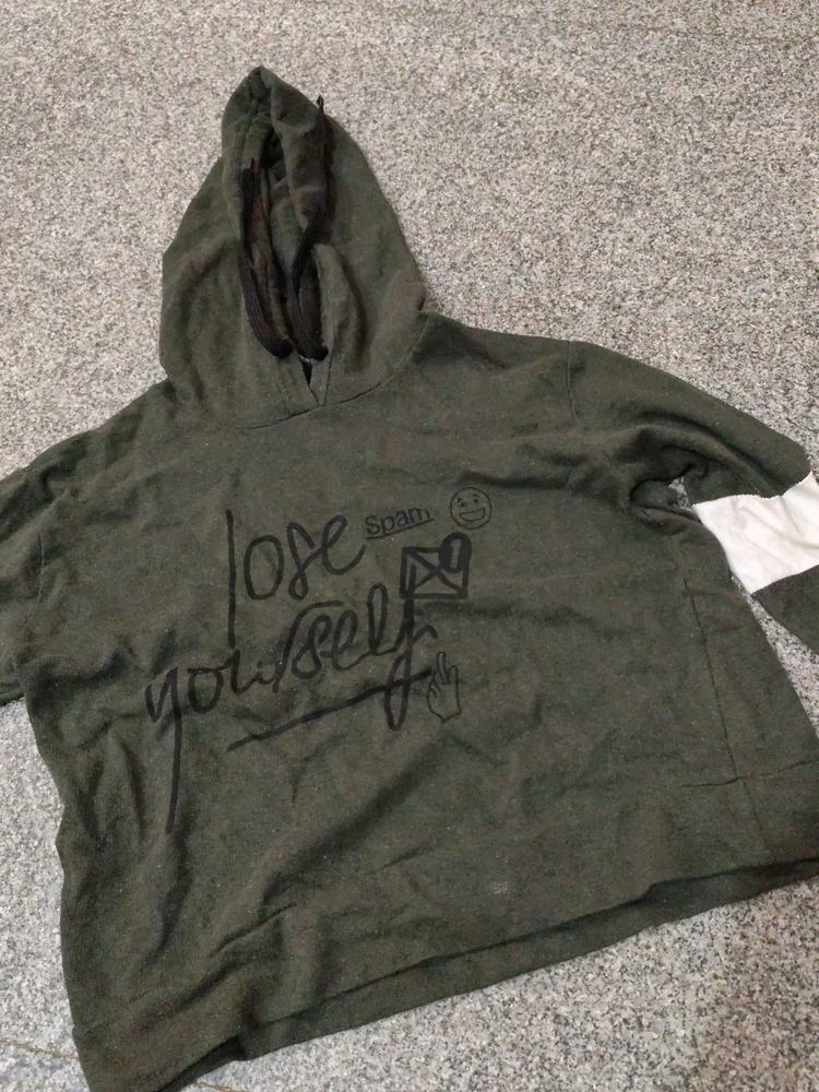 a dark green color hoodie
