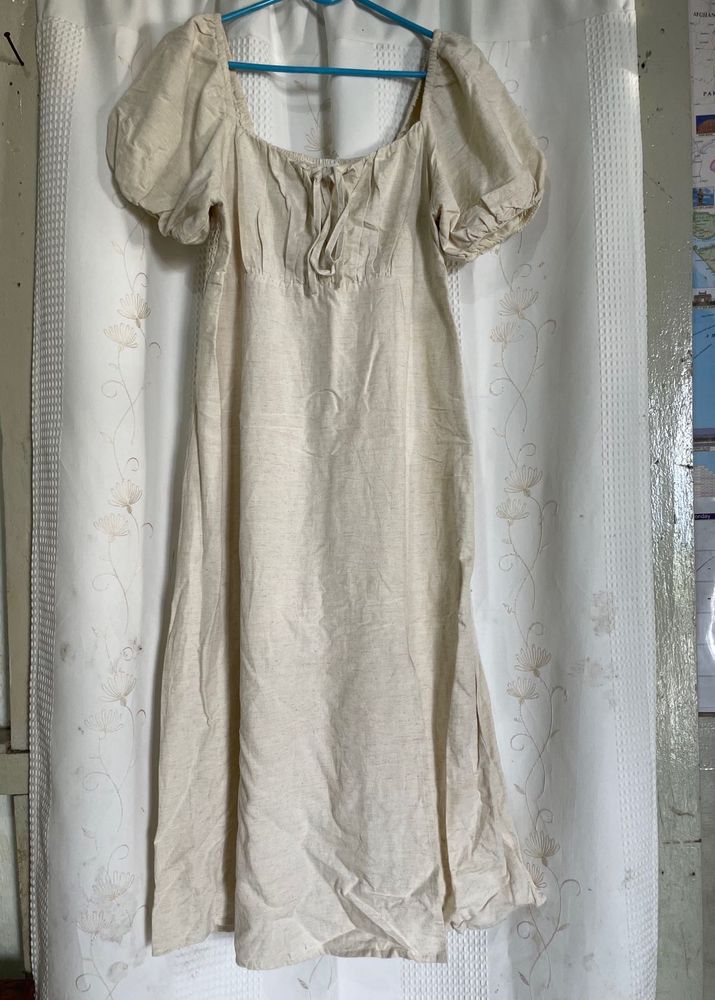 puff-sleeve cream midi dress