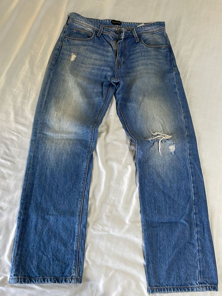 Distressed blue Denim Jeans