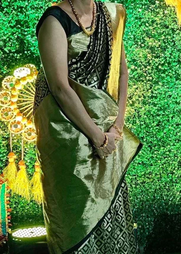black and golden combination saree