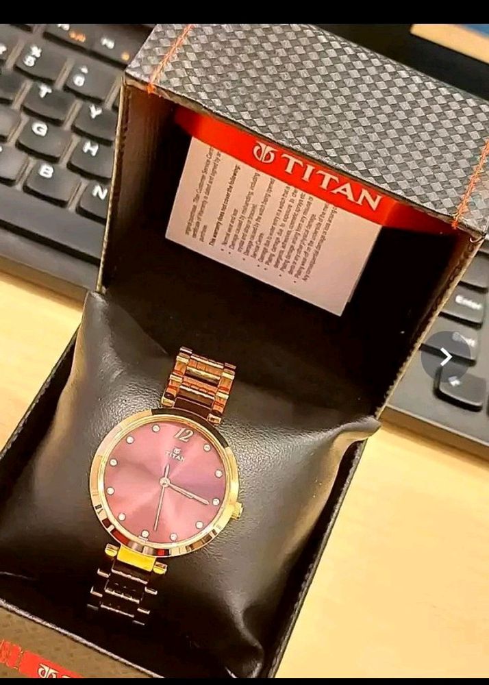 Titan New Women Purple Analogue Watch 2480WM02