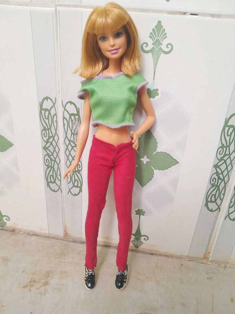 2  Barbie Dolls In Used Condition