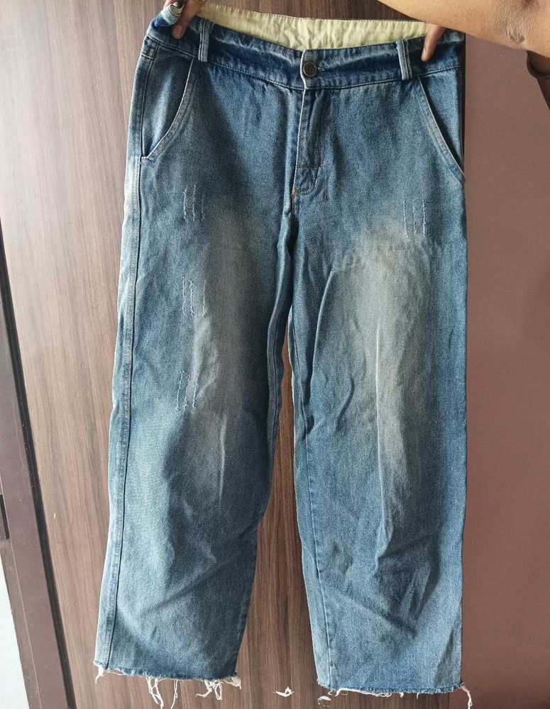 Distressed Denim Jeans