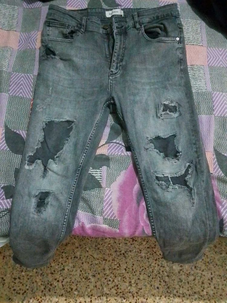 Distressed Gray Denim Jeans