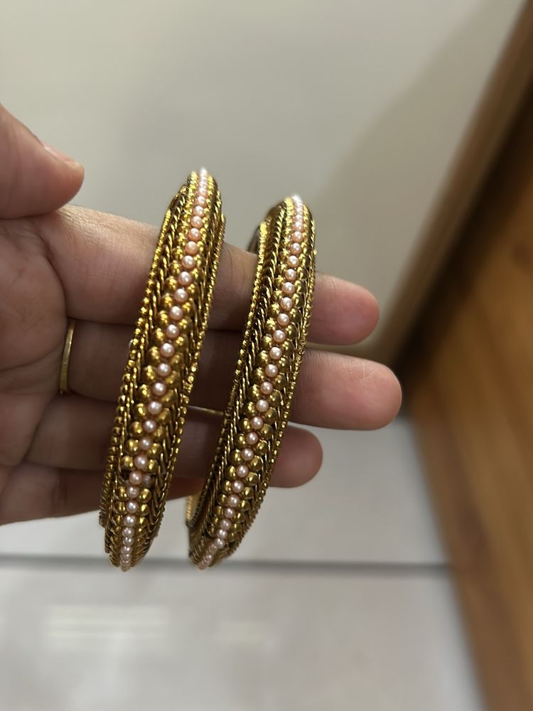 Golden Bangles With Pink Colour Pearls