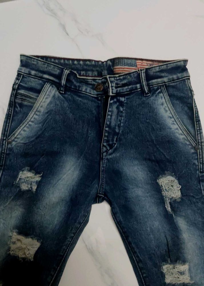 Distressed Denim Jeans