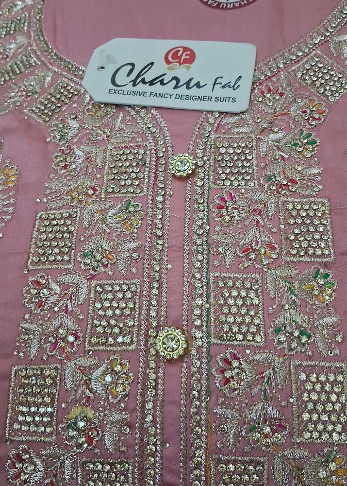 Deepavali    sale pink cotton stone work churidar