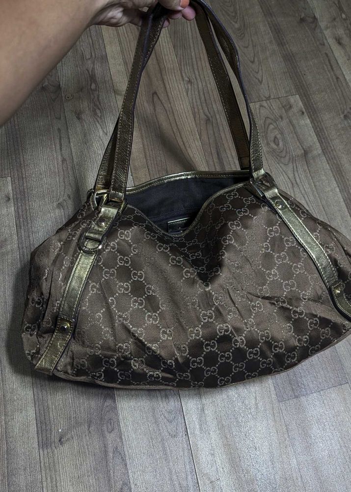 Gucci Gold Metallic Monogram Abbey Dring Toet