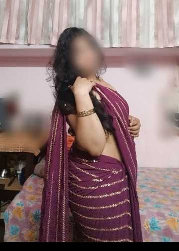 Elegant Purple Saree with Gold Accents