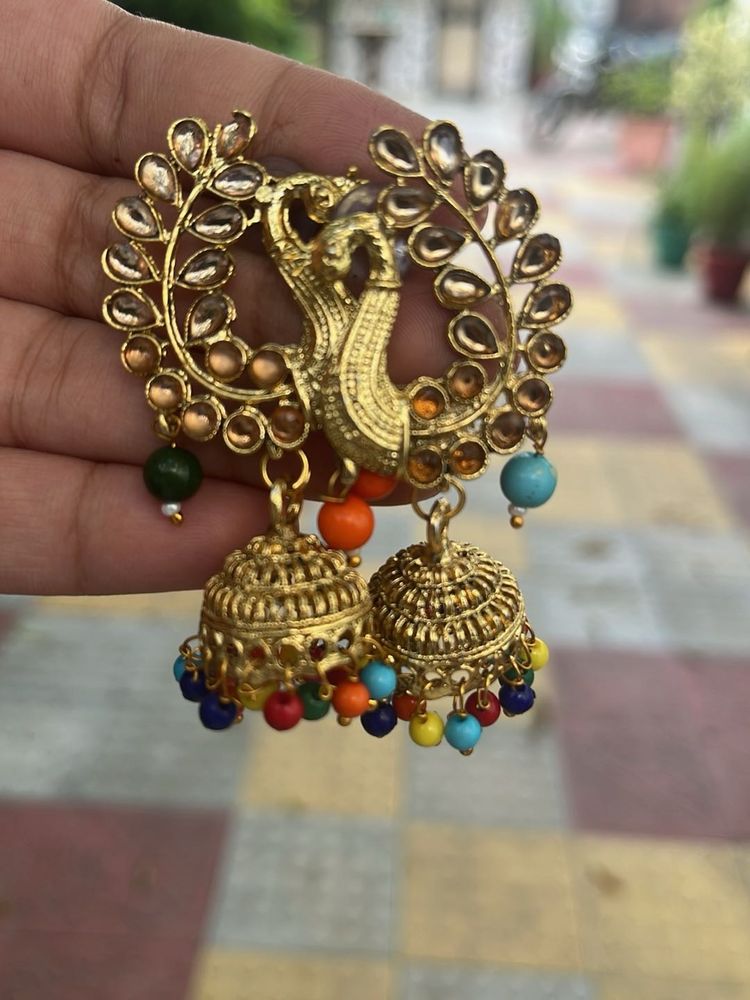 earrings , peacock style