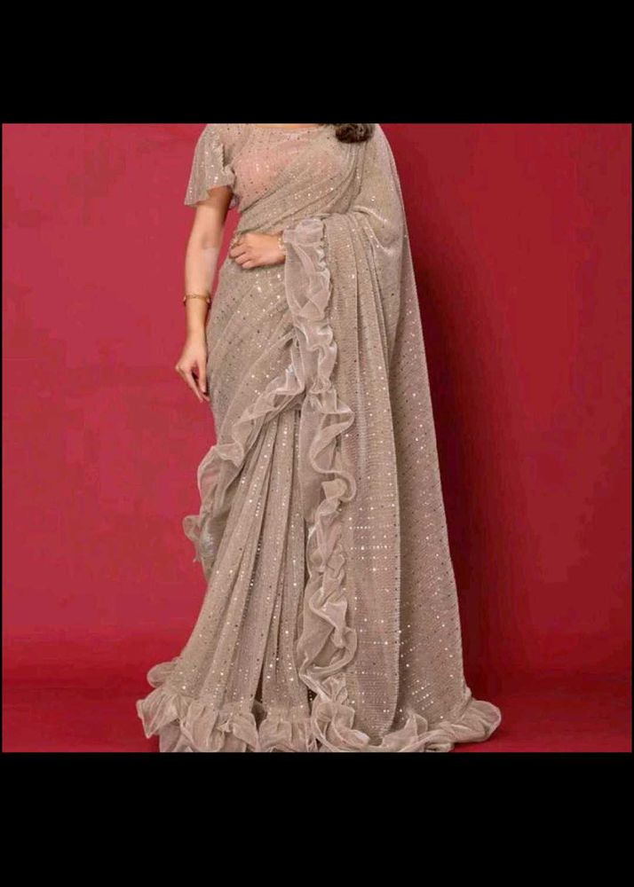 New Ruffle pallu saree with stitched blouse