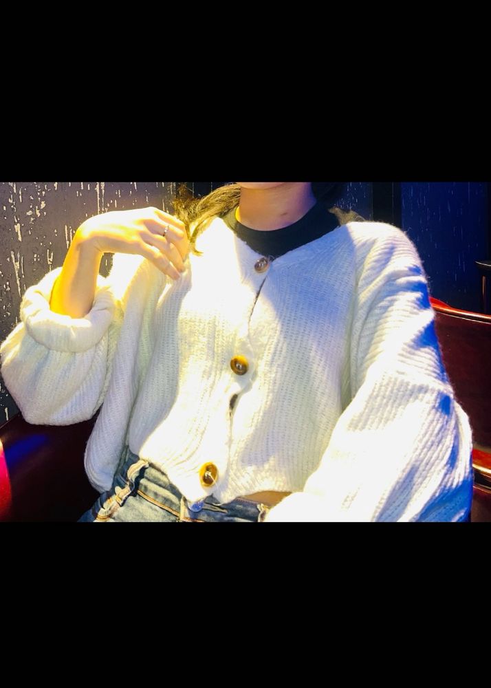 off white woolen top