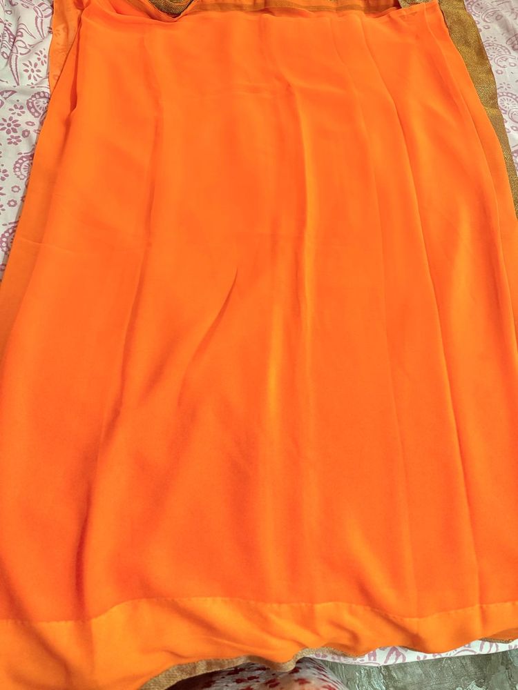 Orange Saree with Gold Border