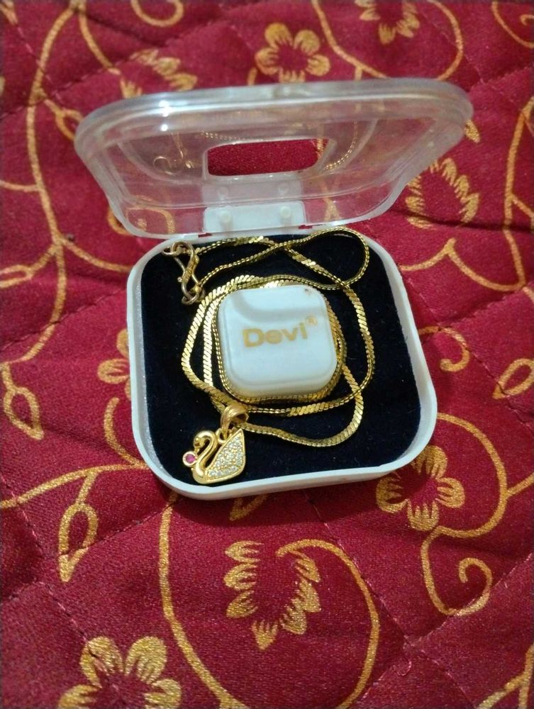 Devi Gold Tone Swan Pendant Necklace