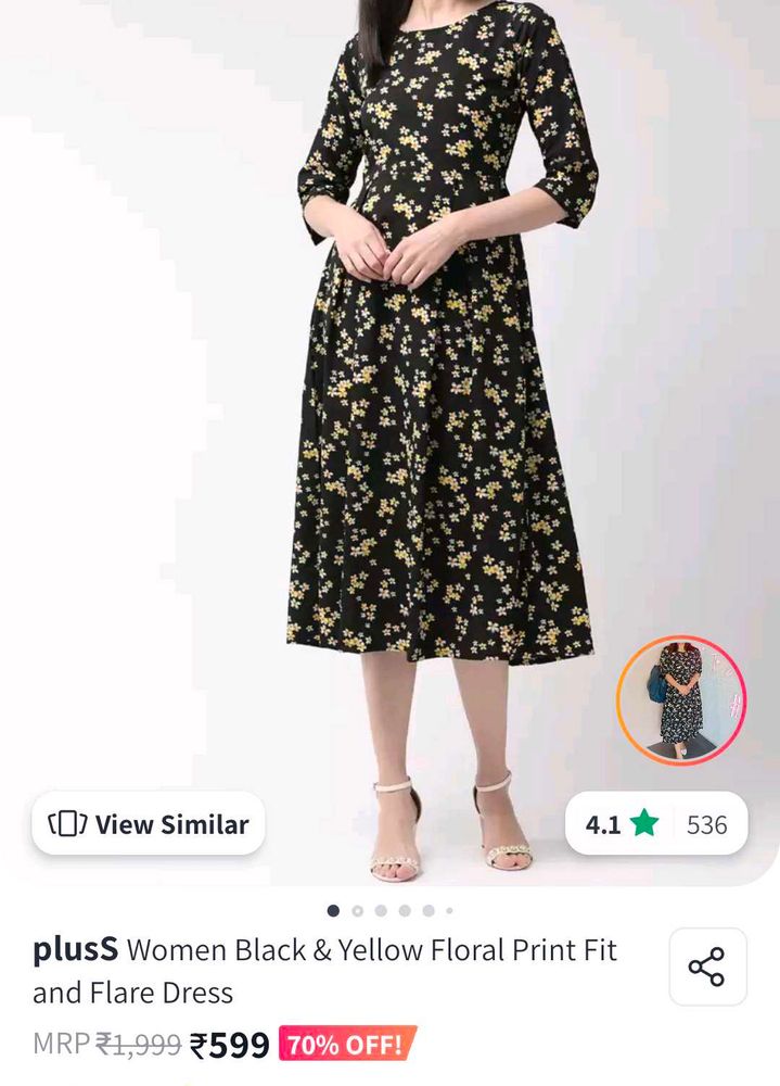 Black dress with yellow n white flowers