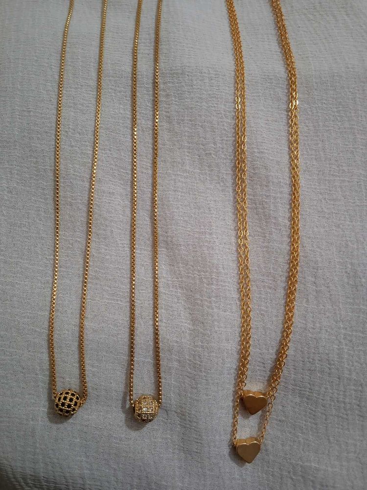 Gold tone layered necklaces