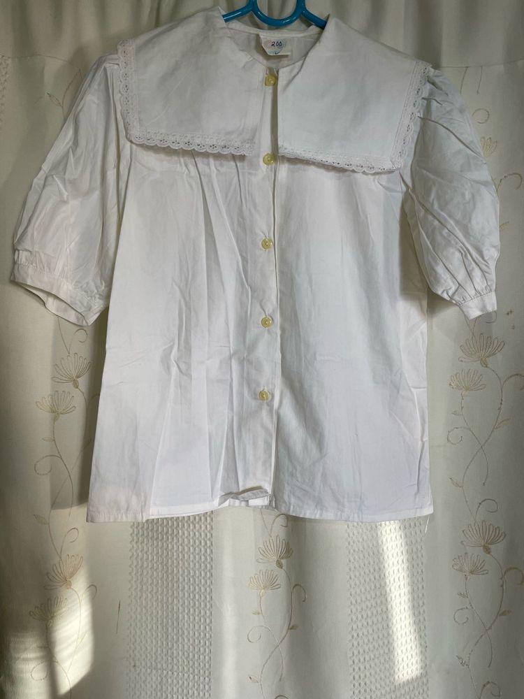 white top with collar