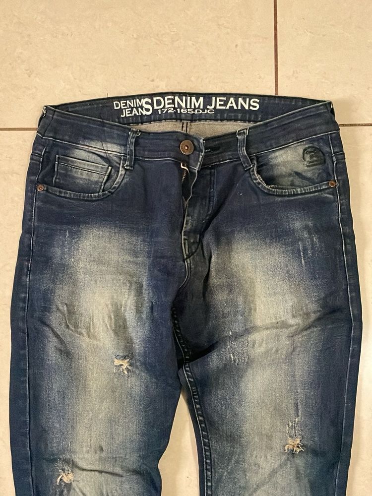 Distressed Denim Jeans