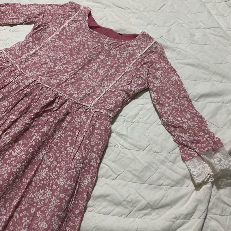 a pink and white flower printed dress