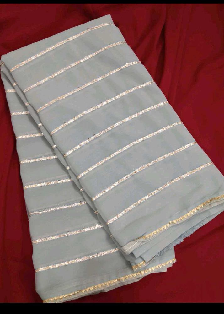 Partywear Grey and Golden saree with blouse