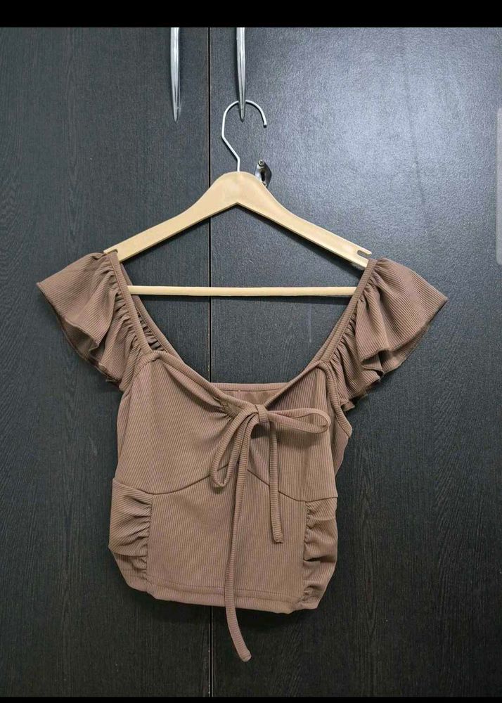 Brown ruffle top