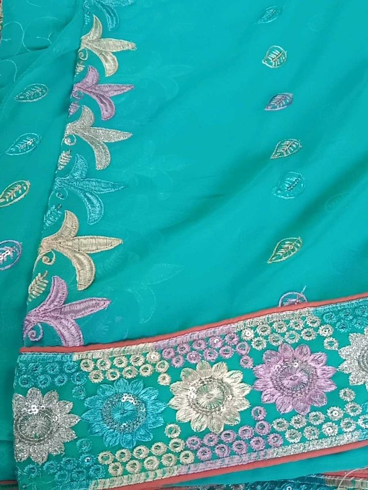 Elegant Teal Embroidered Saree