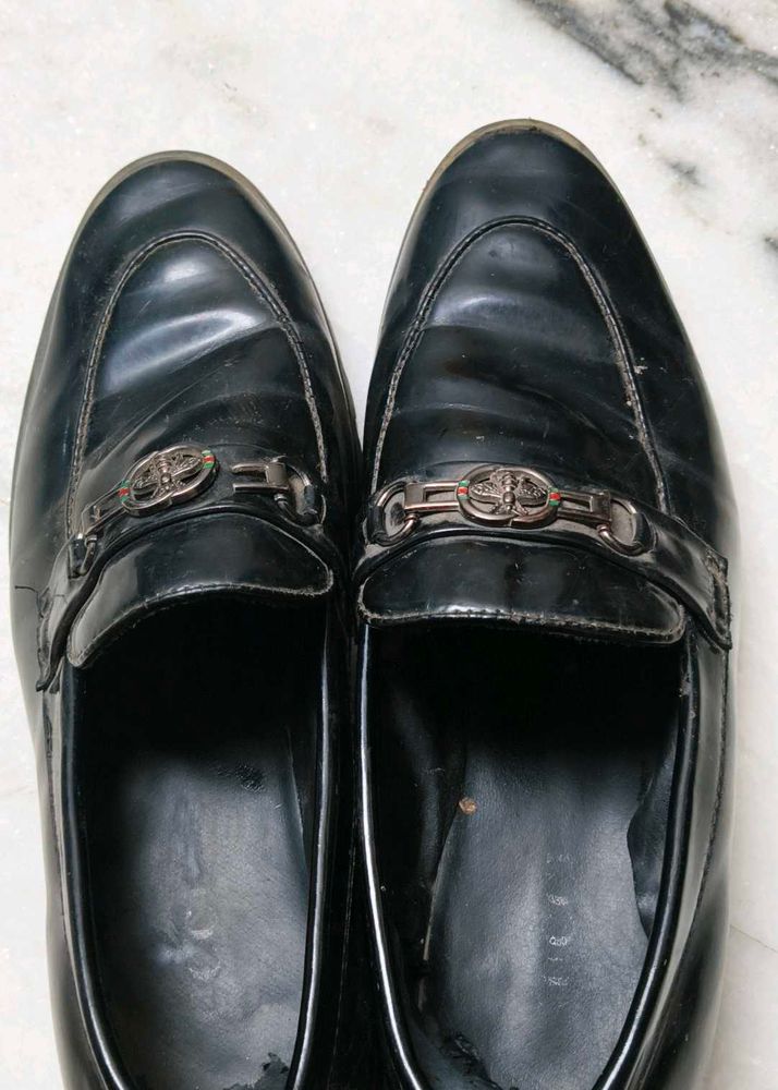 Gucci Shoes And A Pair Of Sports Shoe